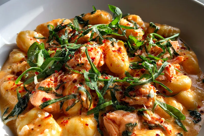 Cooking process for Creamy Salmon Gnocchi Delight