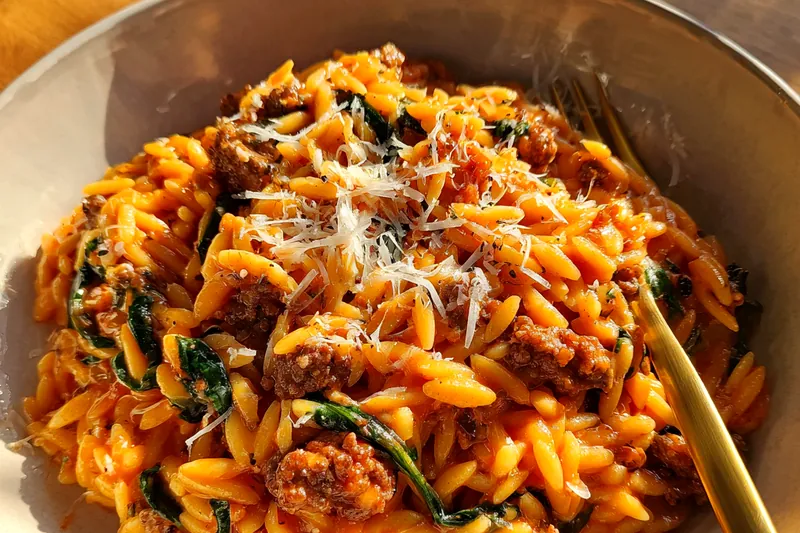 Cooking process for Creamy Tomato Orzo Delight